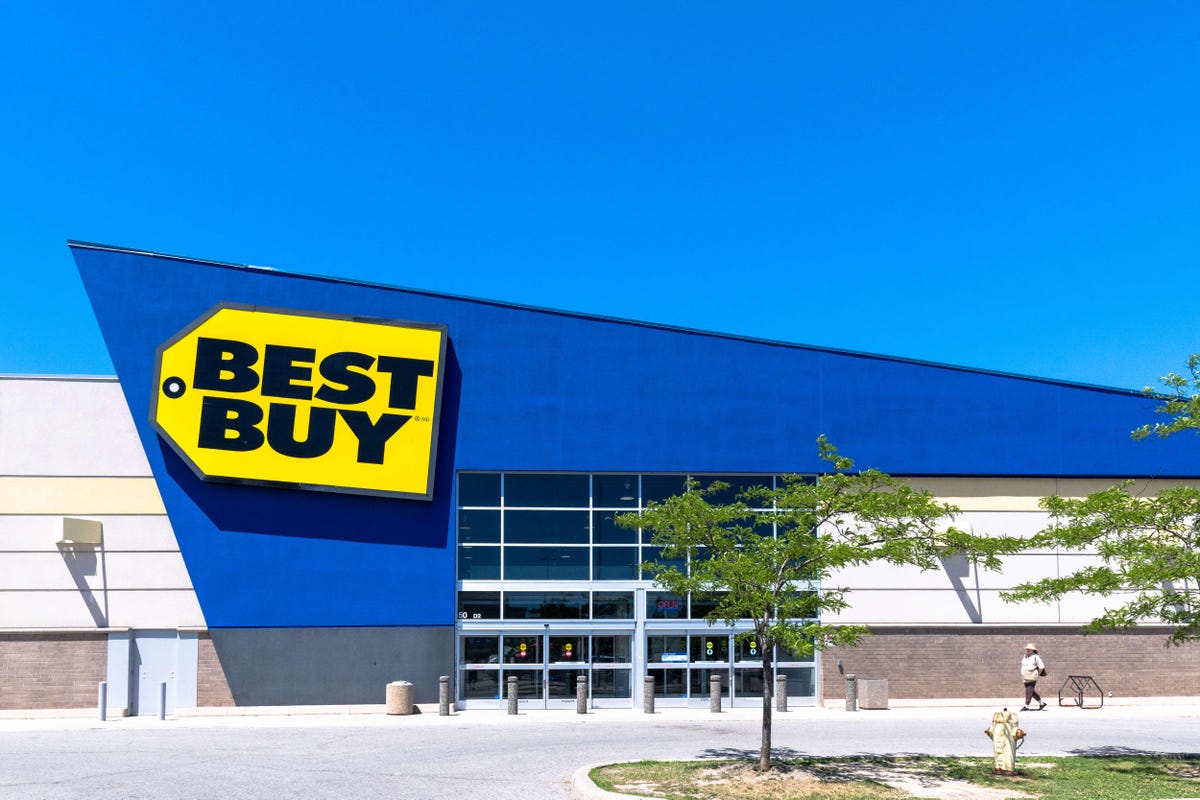 TV Shopping? Consider buying a 2021 TV (and Save Money) 7 Entrance of a Best Buy store during a day with blue clear
