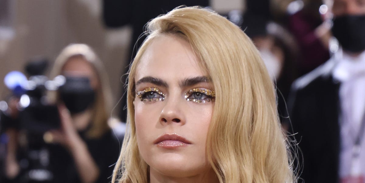 Cara Delevingne Attended the Met Gala Topless and Painted in Gold