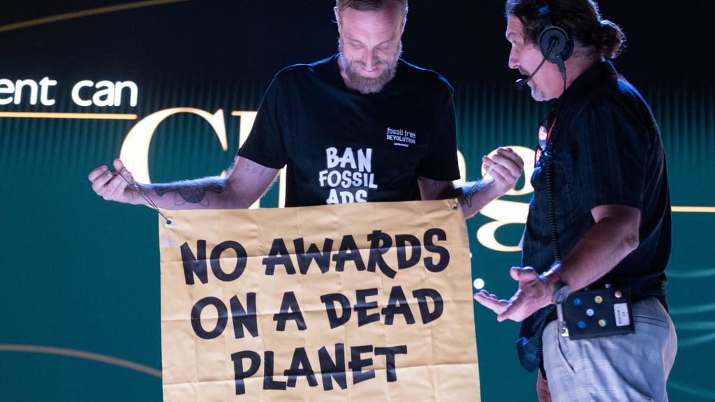 Former Volkswagen Exec and Greenpeace Leader Crashes the Cannes Award Stage. What He Does Next is an Act of True Courage