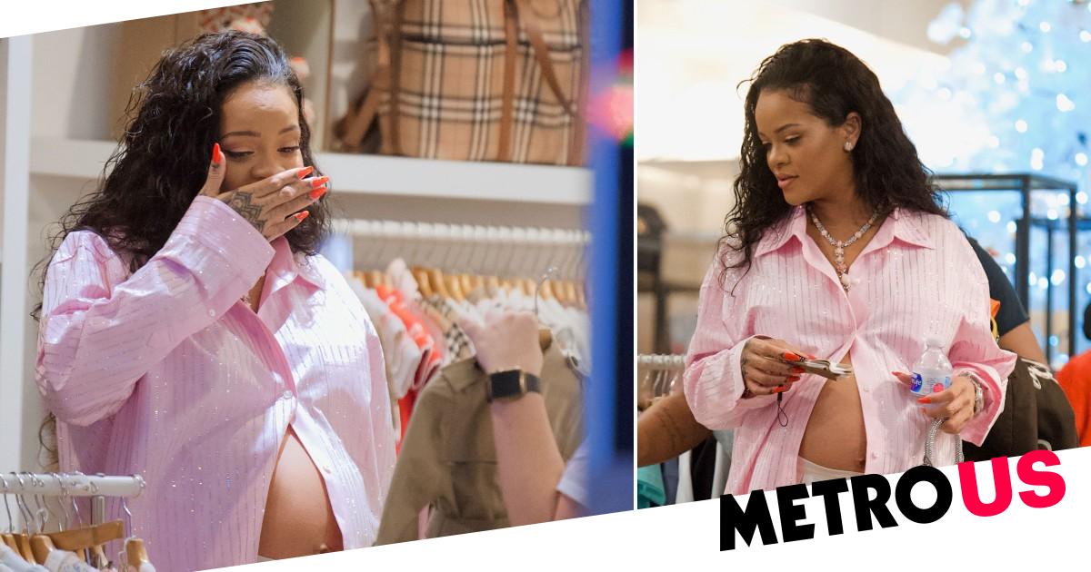 Pregnant Rihanna is pretty in pink as she gets excited over tiny baby outfits