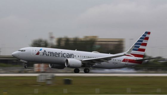 American Airlines Passenger Duct-Tapped To Seat After Attempting To Open Exit Door Mid-Flight